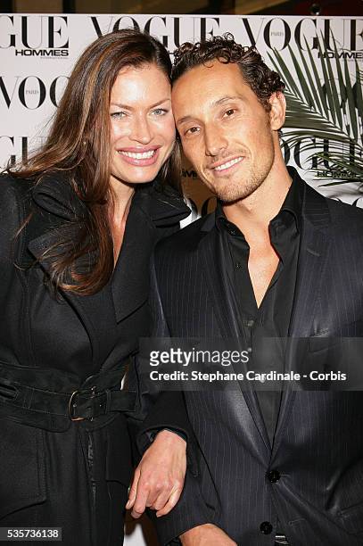 Carre Otis and date arrive at the "Vogue Party" held at the VIP Room in Paris.
