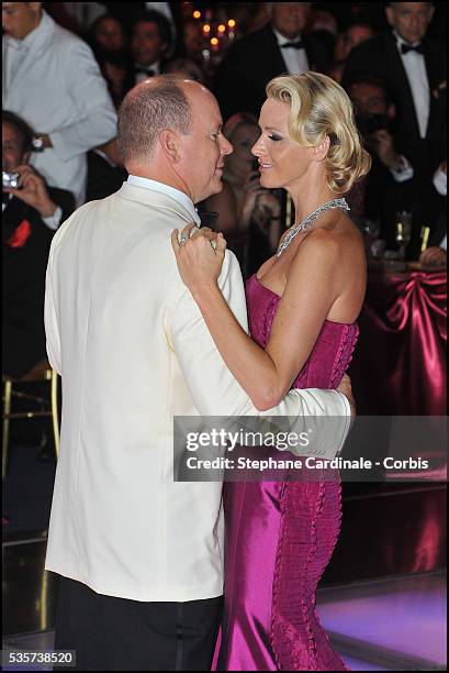 Princess Charlene of Monaco and Prince Albert II of Monaco dance during the 63rd Red Cross Ball at the Sporting Monte-Carlo, in Monaco.