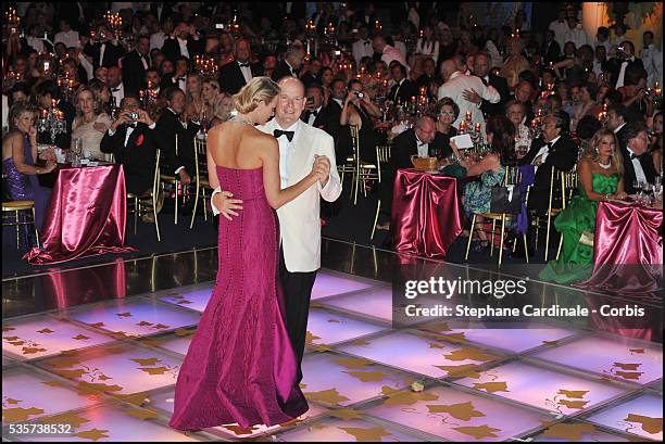 Princess Charlene of Monaco and Prince Albert II of Monaco dance during the 63rd Red Cross Ball at the Sporting Monte-Carlo, in Monaco.