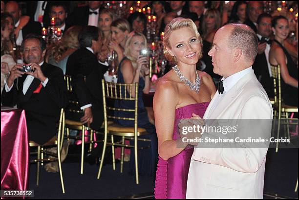 Princess Charlene of Monaco and Prince Albert II of Monaco dance during the 63rd Red Cross Ball at the Sporting Monte-Carlo, in Monaco.