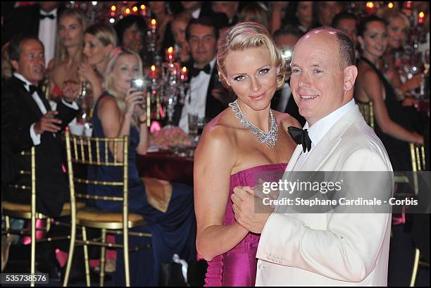 Princess Charlene of Monaco and Prince Albert II of Monaco dance during the 63rd Red Cross Ball at the Sporting Monte-Carlo, in Monaco.