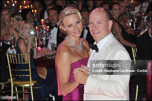 Princess Charlene of Monaco and Prince Albert II of Monaco dance during the 63rd Red Cross Ball at the Sporting Monte-Carlo, in Monaco.