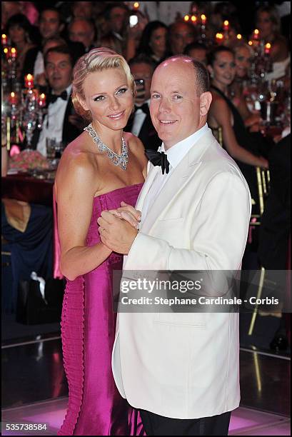 Princess Charlene of Monaco and Prince Albert II of Monaco dance during the 63rd Red Cross Ball at the Sporting Monte-Carlo, in Monaco.