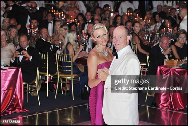 Princess Charlene of Monaco and Prince Albert II of Monaco dance during the 63rd Red Cross Ball at the Sporting Monte-Carlo, in Monaco.