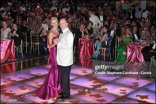 Princess Charlene of Monaco and Prince Albert II of Monaco dance during the 63rd Red Cross Ball at the Sporting Monte-Carlo, in Monaco.