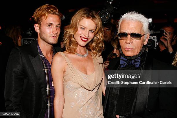 Brad Kroenig with co-hosts supermodel Eva Herzigova and designer Karl Lagerfeld at the private party for the new campaign of Dom Pérignon Rosé...