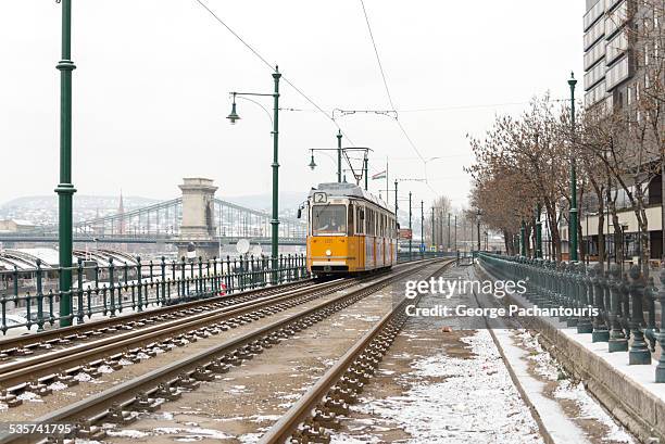 yellow tram in budapest - budapest winter stock pictures, royalty-free photos & images