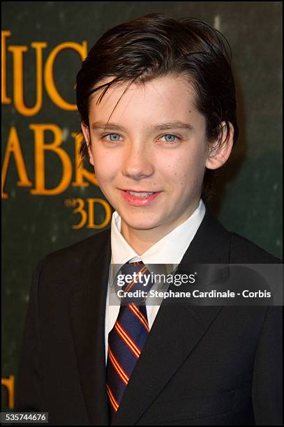 Asa Butterfield attends the premiere of "Hugo Cabret 3D", in Paris.