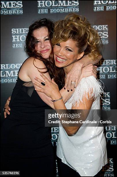 Jane Badler and Ysa Ferrer attend the premiere of Sherlock Holmes : A Game of Shadows at Le Grand Rex, in Paris