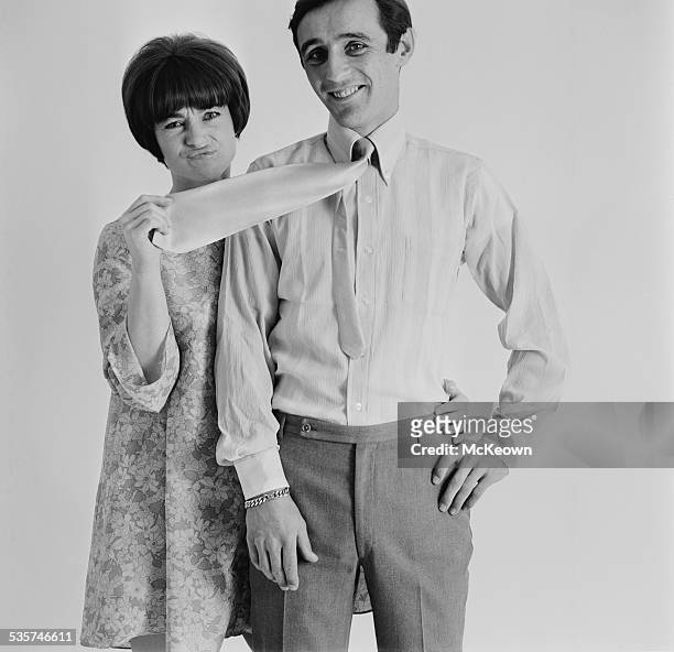 English actress Shirley Anne Field with her fiancé, racing driver Charles Crichton-Stuart , 28th April 1967. Crichton-Stuart is wearing a voile shirt...