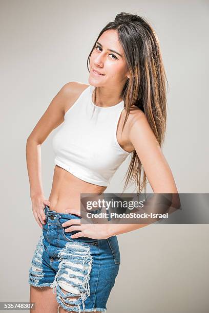 young thin teen with crop top - skinny teen stockfoto's en -beelden