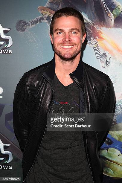 Stephen Amell attends the Teenage Mutant Ninja Turtles: Out of the Shadows fan screening at Village Cinemas Jam Factory on May 30, 2016 in Melbourne,...