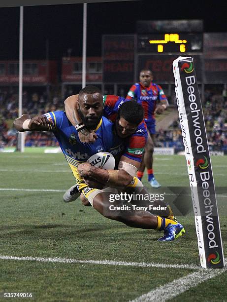 Semi Radradra of the Eels scores a try during the round 12 NRL match between the Newcastle Knights and the Parramatta Eels at Hunter Stadium on May...