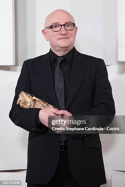 Actor Michel Blanc poses in the Awards Room after being awarded during the 37th Cesar Film Awards at Theatre du Chatelet, in Paris.