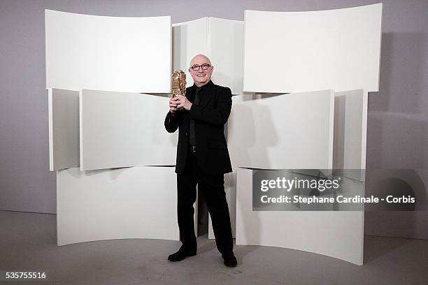 Actor Michel Blanc poses in the Awards Room after being awarded during the 37th Cesar Film Awards at Theatre du Chatelet, in Paris.