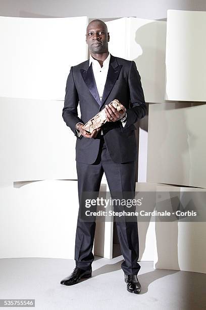 Actor Omar Sy pose in the Awards Room after being awarded for Best Actor during the 37th Cesar Film Awards at Theatre du Chatelet, in Paris.