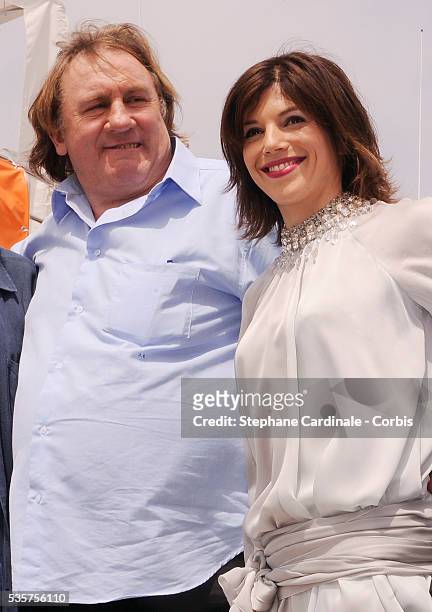 Gerard Depardieu and his girlfriend Clementine Igou promote the actor's Brut Princess Depardieu wine during the 62nd Cannes Film Festival.