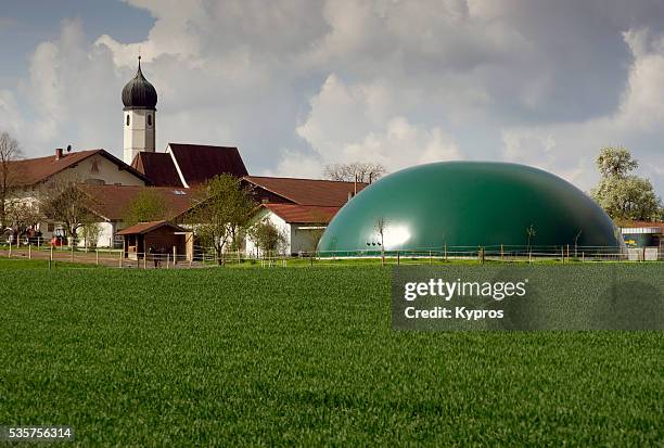 europe, germany, bavaria, view of bavarian church with plastic manure gas storage dome - tapered roots stock pictures, royalty-free photos & images