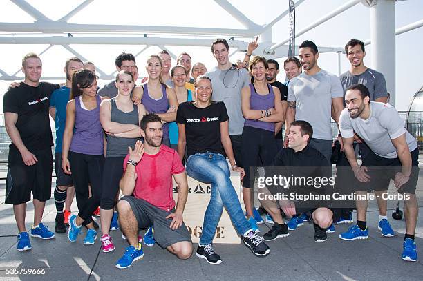 French swimmer Laure Manaudou poses with French CrossFit athletes to launch of Reebok's The Sport of Fitness Campaign at the Georges Pompidou Centre,...