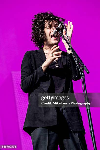 Matthew Healy from the 1975 performs on stage at Powderham Castle on May 29, 2016 in Exeter, England.