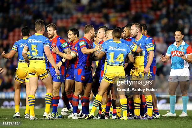 Knights and Eels players during a disagreement during the round 12 NRL match between the Newcastle Knights and the Parramatta Eels at Hunter Stadium...