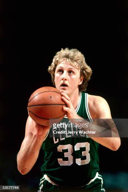 Larry Bird of the Boston Celtics shoots free throw during an NBA game circa 1981. NOTE TO USER: User expressly acknowledges and agrees that, by...