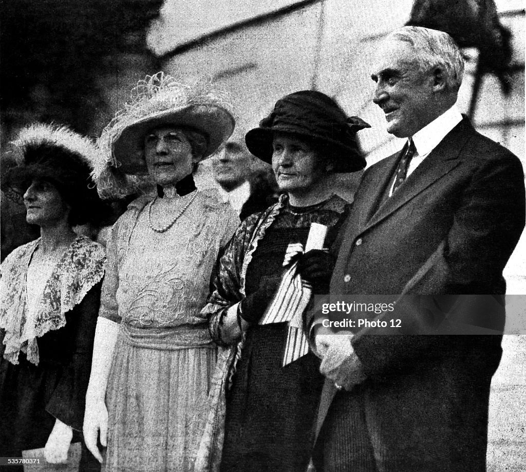 Marie Curie, president Harding and his wife