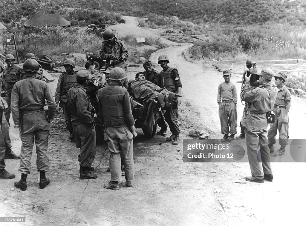 U.N.O. war photographer with U.S. 2nd Infantry Division In Korea.