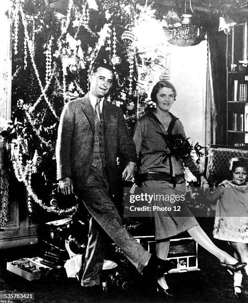 Scott Fitzgerald, Zelda and Scottie celebrating Christmas,, 1926.