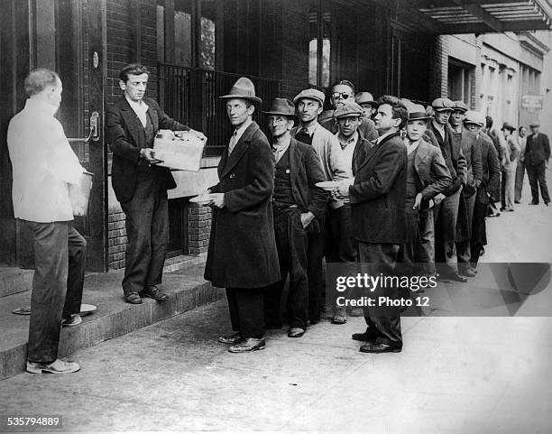 During Hoover's presidential term of office, free meals are distributed in Washington. Line in front of 'soup kitchens',, c.1930,, United States,,...