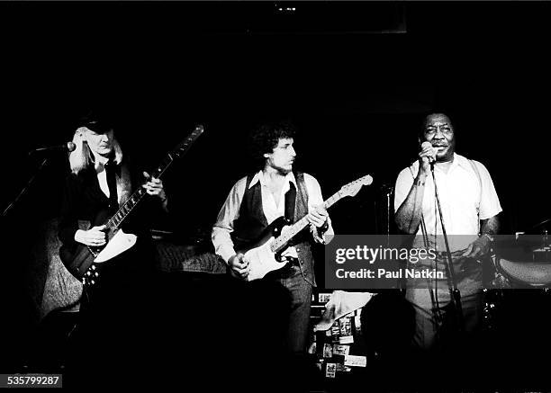 From left, Johnny Winter, Bob Margolin and Muddy Waters perform at Harry Hope's, Cary, Illinois, August 25, 1978.