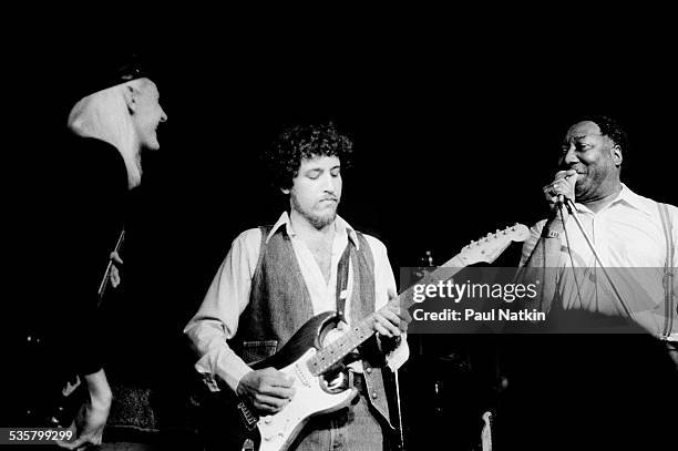 From left, Johnny Winter, Bob Margolin and Muddy Waters perform at Harry Hope's, Cary, Illinois, August 25, 1978.