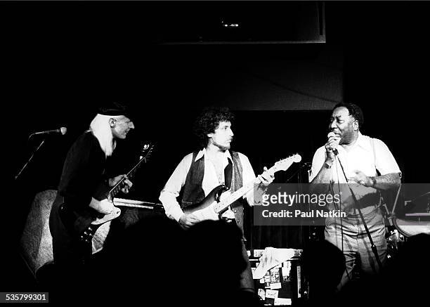 From left, Johnny Winter, Bob Margolin and Muddy Waters perform at Harry Hope's, Cary, Illinois, August 25, 1978.
