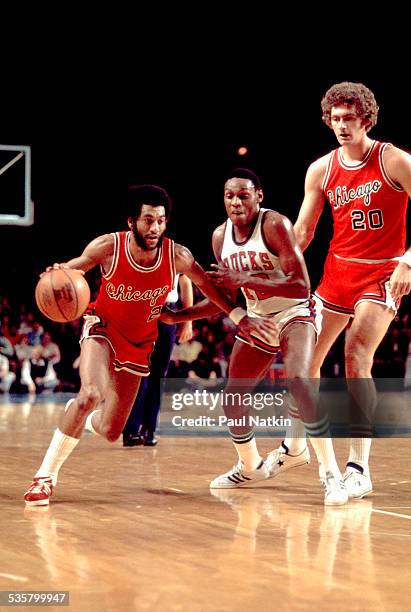 Norm Van Lier of the Chicago Bulls drives past a defender during a game against the Milwaukee Bucks, Chicago, Illinois, 1972.