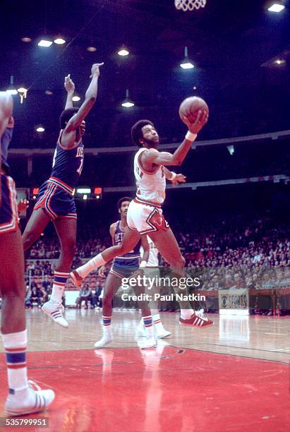 Norm Van Lier of the Chicago Bulls drives into the lane during a game against the Detroit Pistons, Chicago, Illinois, 1972.