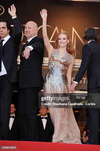 John Hillcoat, Jessica Chastain and Shia LaBeouf at the premiere for "Lawless" during the 65th Cannes International Film Festival.