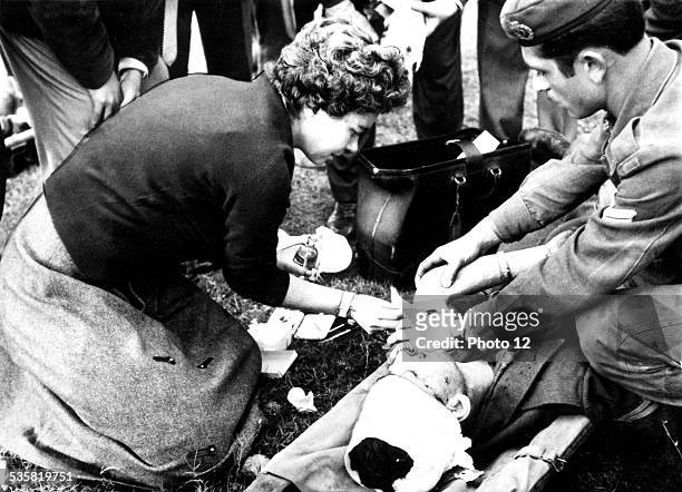 Queen Frederika treating soldiers injured during the war, 20th century, Greece, Second World War war, Private collection, .