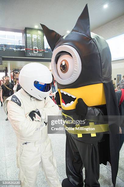 The Stig meets Batman Minion on Day 2 of MCM London Comic Con at The London ExCel on May 28, 2016 in London, England.