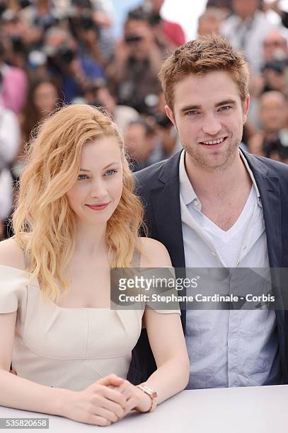 Sarah Gadon and Robert Pattinson at the photo call for "Cosmopolis" during the 65th Cannes International Film Festival.