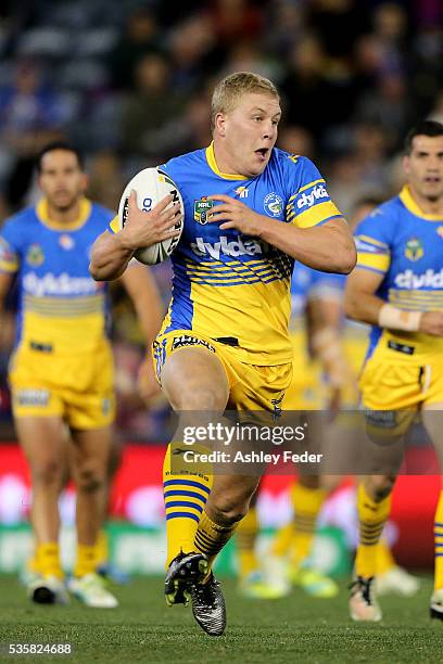 Daniel Alvaro of the Eels runs the ball during the round 12 NRL match between the Newcastle Knights and the Parramatta Eels at Hunter Stadium on May...