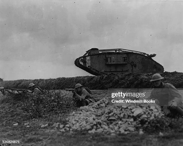 107th Infantry Regiment, 27th Division train with tanks near Beauquesnes, France, 13 September, 1918. The tanks would charge an imaginary enemy...