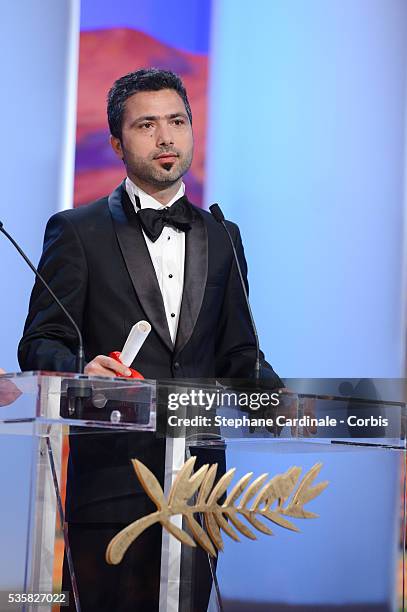 Director L. Rezan Yesilbas receives the Palme d'Or for Short Films for 'Sessiz-be deng' onstage at the Closing Ceremony during the 65th Annual Cannes...