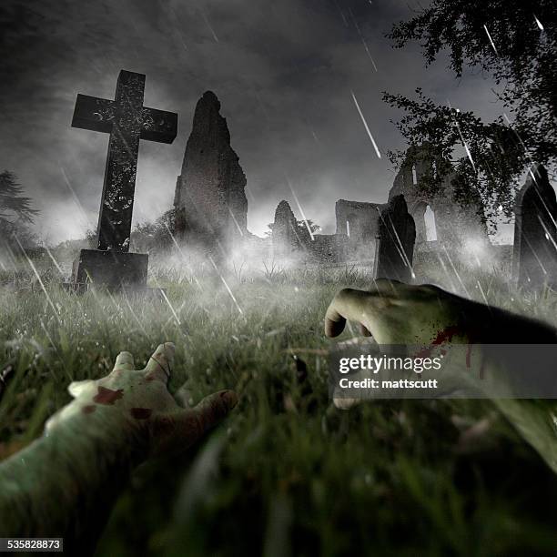 zombie hands on graveyard - zombie hand stock pictures, royalty-free photos & images