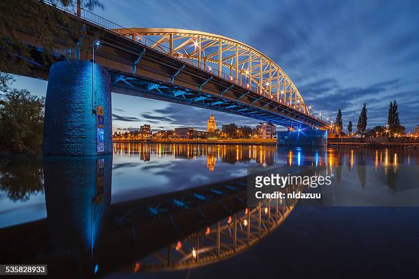 john frost bridge at night, arnhem, holland - arnhem netherlands stock pictures, royalty-free photos & images