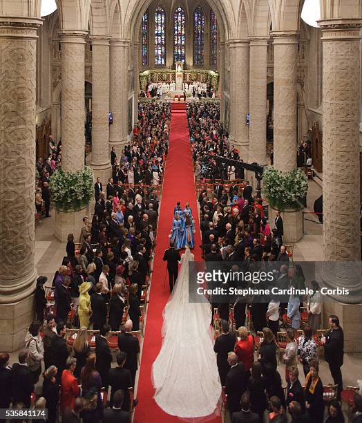 Princess Stephanie of Luxembourg walks down the aisle with her brother Count Jehan de Lannoy and bridesmaids during the wedding ceremony of Prince...