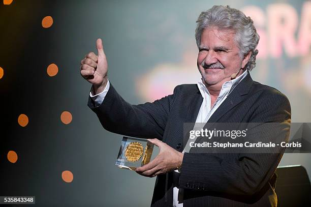 Roland Magdane receives the Grand Prix de l'Humour during the Grands Prix Sacem 2012 Ceremony at the Casino de Paris, in Paris.