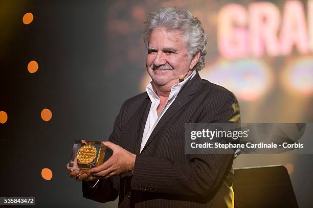 Roland Magdane receives the Grand Prix de l'Humour during the Grands Prix Sacem 2012 Ceremony at the Casino de Paris, in Paris.