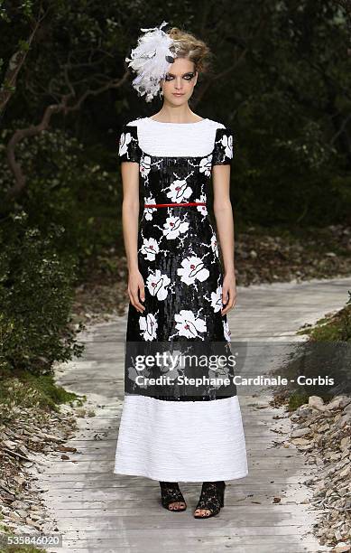 Model walks the runway during the Chanel Spring/Summer 2013 Haute-Couture show in Paris