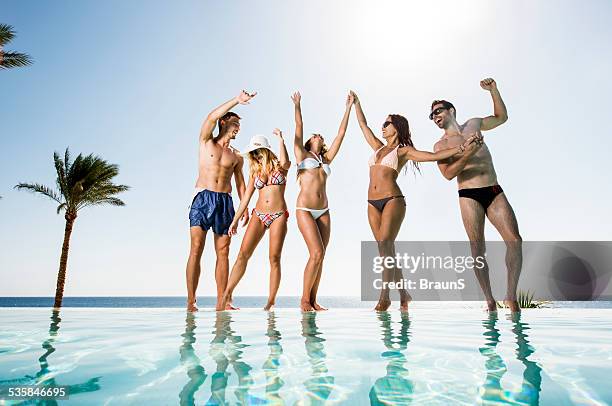 party at infinity pool. - pool party stock pictures, royalty-free photos & images