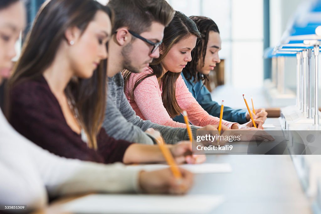 Group of teenagers taking a test